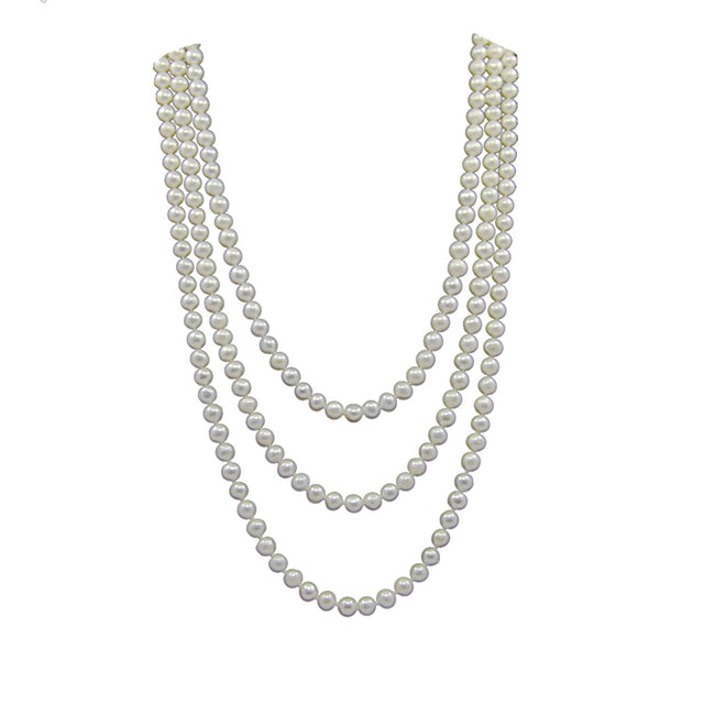 White Freshwater cultured pearl endless necklace shown draped in three nested loops; 60-inch total strand length.