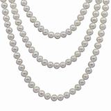 Close view of the three nested curves shown in the original photo of the 60-inch white Freshwater cultured pearl endless strand; AI-assisted detail view based on the original photo.