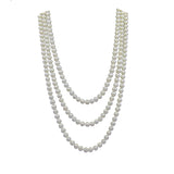 White Freshwater cultured pearl endless necklace shown draped in three nested loops; 60-inch total strand length.